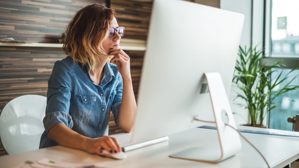 Woman working making plan to update her offer